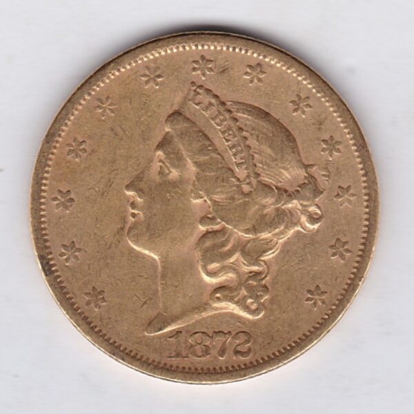 1872 S USA Twenty Dollars coin featuring the Lady Liberty on the Obverse. The eagle with a shield on its chest completes the Reverse.