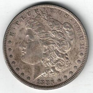 1883 Silver USA Morgan Dollar coin featuring lady liberty on the obverse. The eagle holding arrows and an olive branch on the reverse.