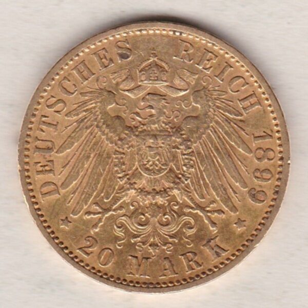 1899 A Germany Gold Twenty Mark coin featuring the bust of Wilhelm II on the obverse. The crowned imperial eagle on the reverse.