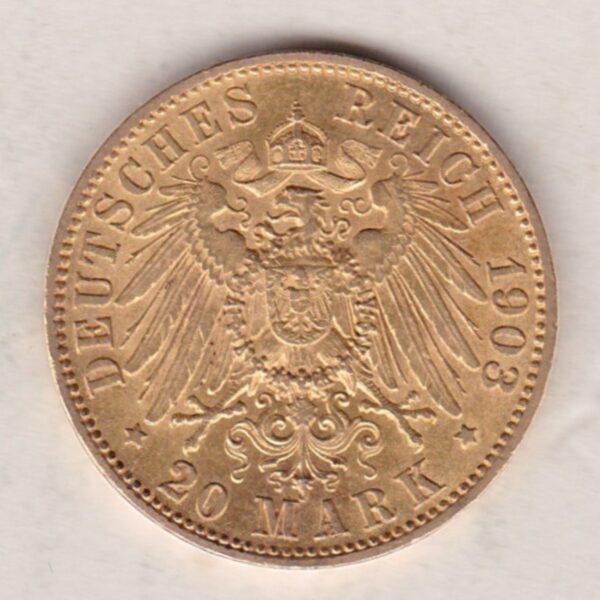 1903 A Germany Gold Twenty Mark coin featuring the bust of Wilhelm II on the obverse. The crowned imperial eagle on the reverse.
