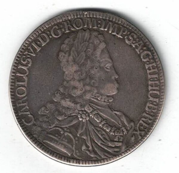 The 1716 Thaler is a coin struck in .875 silver.  The obverse of this coin features the bust of Charles VI. The reverse features the Imperial Eagle.