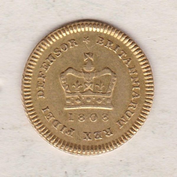 1808 Gold Third Guinea Coin featuring the laureate head portrait of King George III on the obverse. The reverse central crown with legend around and date.