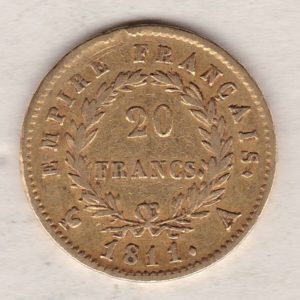 1811 A France Gold Twenty Francs coin featuring the portrait of Napoleon I on the Obverse. The denomination within a wreath on the Reverse.