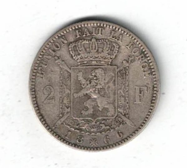 1866 Belgium Silver Two Franc Coin . The obverse features Leopold II facing left. The reverse features Crowned arms on ornate shield divide denomination.