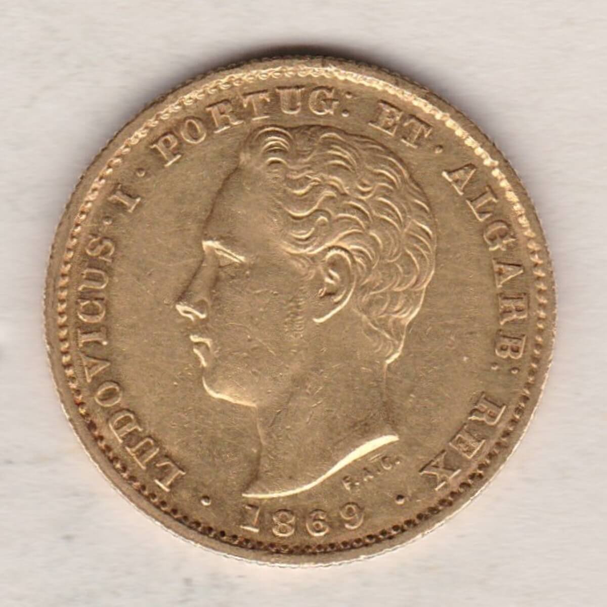 1869 Portugal Gold 5000 Reis Coin. The obverse features the portrait of Luís I of Portugal facing left. The reverse features a crowned mantled arms.