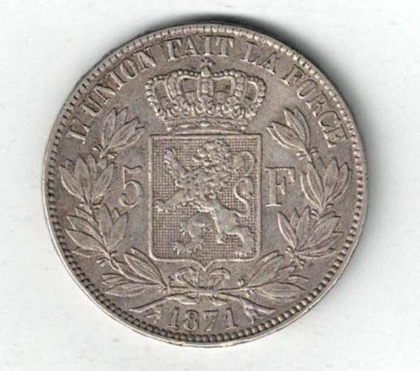1871 Belgium Silver Five Francs Coin. The obverse features Leopold II facing left. The reverse features Crowned arms on ornate shield divide denomination.
