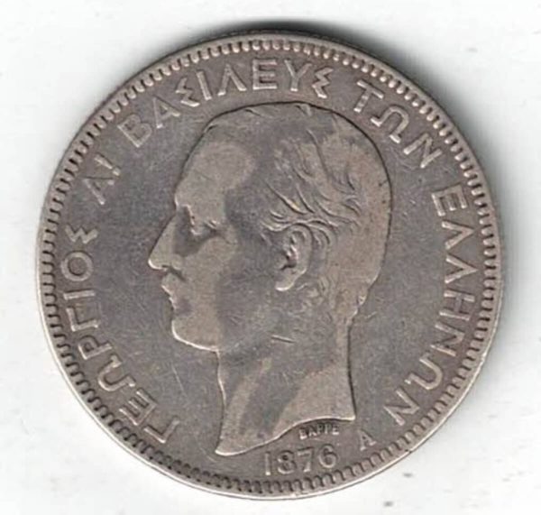1876 A Greece George I Five Drachmai Coin . The obverse features George I, The reverse features arms within the crowned mantle with denomination below.