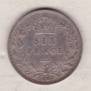 1887 Silver Sixpence coin featuring Queen Victoria on the Obverse. The Reverse features a crowned denomination within wreath.