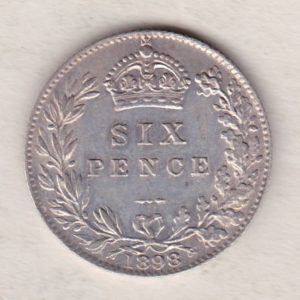 1898 Silver Sixpence coin featuring Queen Victoria on the Obverse. The Reverse features a crowned denomination within wreath.
