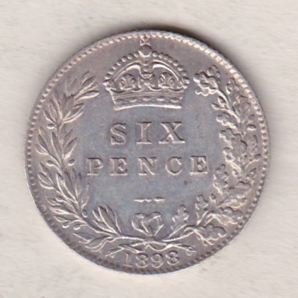 1898 Silver Sixpence coin featuring Queen Victoria on the Obverse. The Reverse features a crowned denomination within wreath.