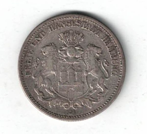 1899 J Germany Silver Two Mark Coin features Coat of arms of the Free and Hanseatic City of Hamburg. The reverse an imperial Germany eagle.