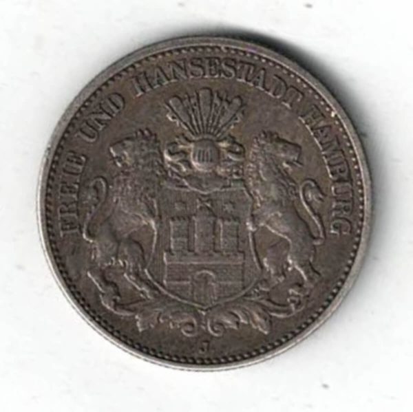 1906 J Germany Silver Two Mark Coin features Coat of arms of the Free and Hanseatic City of Hamburg. The reverse an imperial Germany eagle.