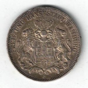 1911 J Germany Silver 3 Mark features features three tower castle on helmeted shield with supporters. The Reverse Crowned imperial eagle, shield on breast