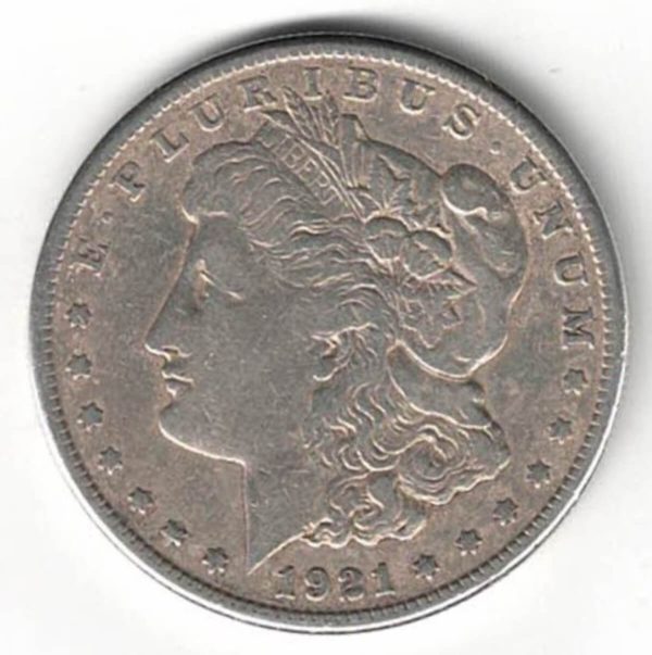 1921 S Silver USA Morgan Dollar coin featuring lady liberty on the obverse. The eagle holding arrows and an olive branch on the reverse.