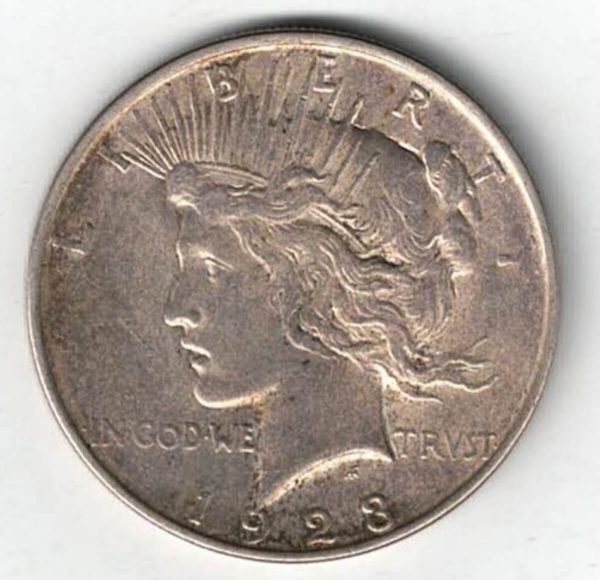 1923 D Silver USA Peace Dollar coin. The Obverse features the capped head of Liberty facing left. The American eagle on the reverse.