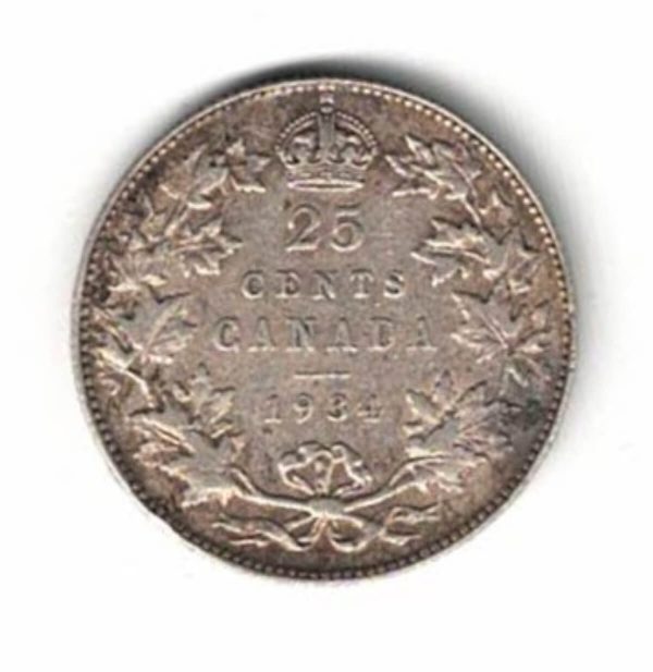 1934 Canada Silver 25 Cent Coin. The obverse features George V .The reverse features the face value, the inscription Canada with the date