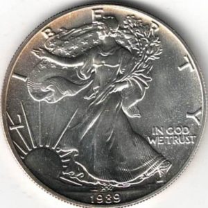 1989 Silver USA One Ounce Eagle. The liberty is on the obverse, The eagle is on the reverse. The coin contains one ounce of 999 fine silver.