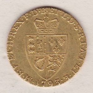 1793 Gold Guinea Coin featuring the fifth laureate head portrait of King George III on the obverse. The spade-shaped shield design is on the reverse.