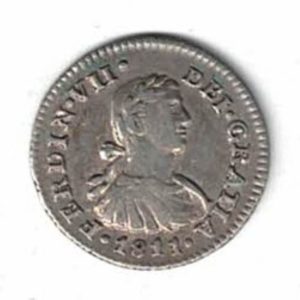 1811 Mo HJ Mexico Silver Half Real Coin. The obverse features the bust facing right. The reverse features Hispanic arms a pair of pillars.