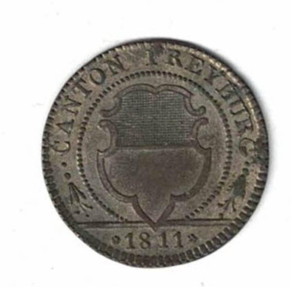 1811 Switzerland Canton Freiburg Billon One Batzan Coin. The obverse features shield and date. The reverse features the denomination.