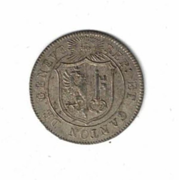 1817H Switzerland Geneva One & Half Sol/Six Deniers Billon Coin. The obverse features IHS in sun above arms. The reverse features wheat stalks.