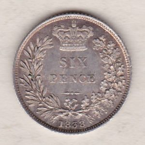 1838 silver sixpence coin featuring young head Queen Victoria on the Obverse. The crowned denomination within a wreath and date below on the Reverse.