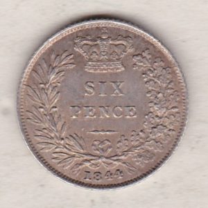 1844 silver sixpence coin featuring young head Queen Victoria on the Obverse. The crowned denomination within a wreath and date below on the Reverse.