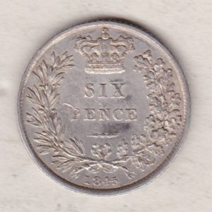 1845 silver sixpence coin featuring young head Queen Victoria on the Obverse. The crowned denomination within a wreath and date below on the Reverse.