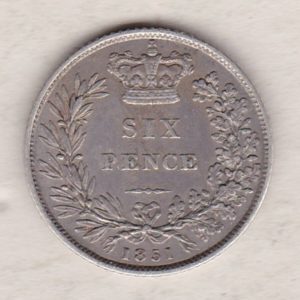 1851 silver sixpence coin featuring young head Queen Victoria on the Obverse. The crowned denomination within a wreath and date below on the Reverse.