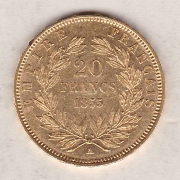 1855 A France Gold Twenty Francs coin featuring Napoleon III on the Obverse. The reverse has the denomination above the date within a wreath.