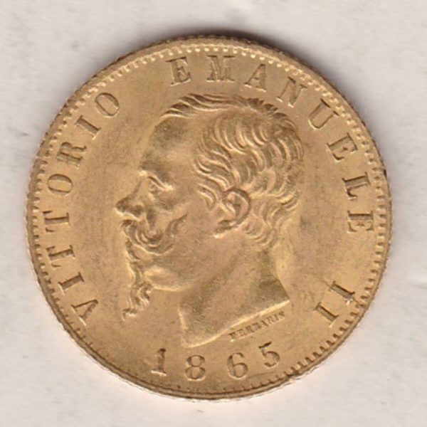 1865 T BN Italy Gold Twenty Lire coin featuring King Vittorio Emanuele II on the obverse. The crowned Savoy shield of arms on the reverse.