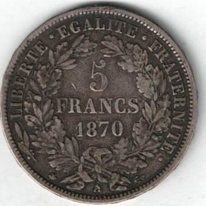 1870 A France Silver Five Francs Coin. The obverse features a Laureate head facing left. The reverse features the face value and date.