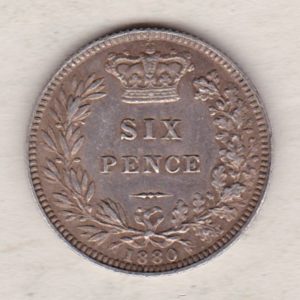 1880 Silver Sixpence coin featuring Queen Victoria on the Obverse. The Reverse features a crowned denomination within wreath.