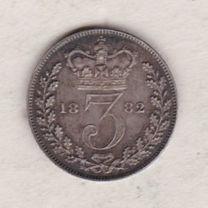 1882 Silver Threepence coin featuring the portrait of Queen Victoria on the Obverse. The Reverse features a crowned denomination dividing the date.