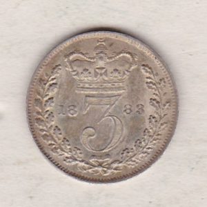 1883 Silver Threepence coin featuring the portrait of Queen Victoria on the Obverse. The Reverse features a crowned denomination dividing the date.