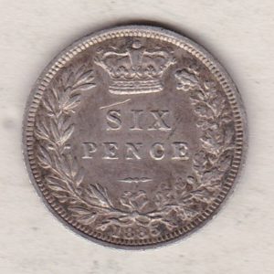 1885 Silver Sixpence coin featuring Queen Victoria on the Obverse. The Reverse features a crowned denomination within wreath.