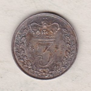 1886 Silver Threepence coin featuring the portrait of Queen Victoria on the Obverse. The Reverse features a crowned denomination dividing the date.