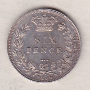 1886 Silver Sixpence coin featuring Queen Victoria on the Obverse. The Reverse features a crowned denomination within wreath.