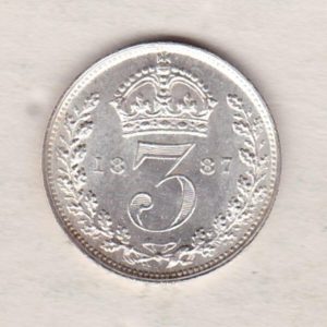 1887 Silver Threepence coin featuring the portrait of Queen Victoria on the Obverse. The Reverse features a crowned denomination dividing the date.