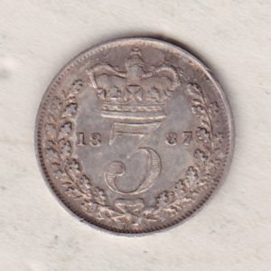 1887 Silver Threepence coin featuring the portrait of Queen Victoria on the Obverse. The Reverse features a crowned denomination dividing the date.