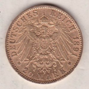 1891 A Germany Gold Twenty Mark coin featuring the bust of Wilhelm II on the obverse. The crowned imperial eagle on the reverse.