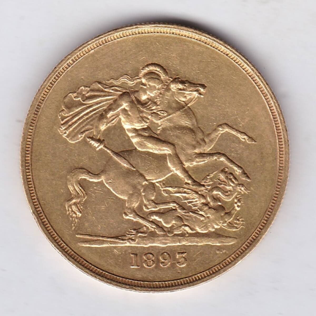 1893 gold five pounds struck in 22 carat gold. The obverse features the Queen Victoria old head. The reverse depicts St George and the dragon.