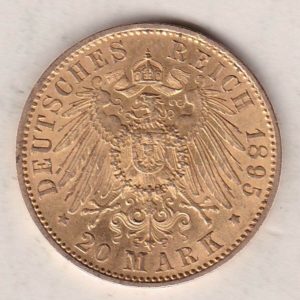 1895 A Germany Gold Twenty Mark coin featuring the bust of Wilhelm II on the obverse. The crowned imperial eagle on the reverse.