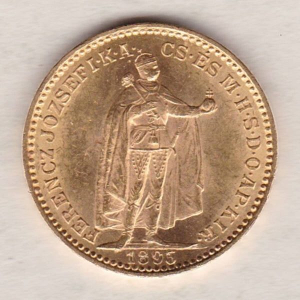 1895 Hungary Gold 20 Korona coin featuring the Emperor Francis Joseph I on the reverse. The obverse features a crowned shield with angel supporters.