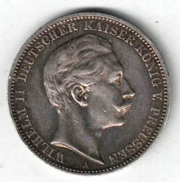 1909 A Germany Silver Three Mark Coin featuring the bust of Wilhelm II on the obverse. The crowned imperial eagle on the reverse.