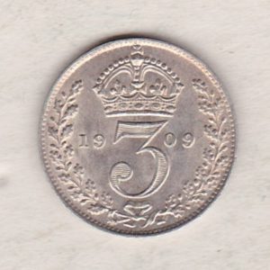 1909 Silver Threepence coin featuring the portrait of King Edward VII on the Obverse. The Reverse features a crowned denomination dividing the date.