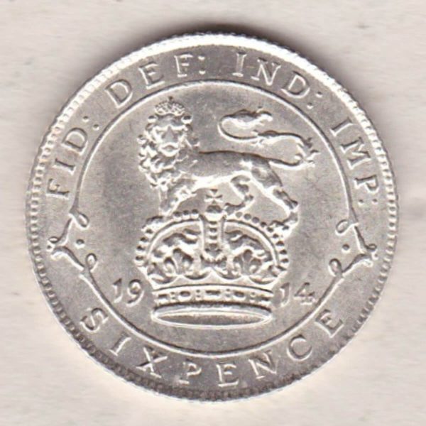 1914 Silver Sixpence coin featuring King George V on the Obverse. The Reverse features a crowned lion with date and denomination.