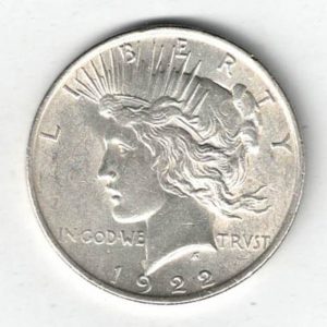 1922 Silver USA Peace Dollar coin. The Obverse features the capped head of Liberty facing left. The American eagle on the reverse.
