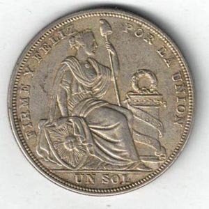 1923 Peru Silver One Sol Coin. The obverse features the national arms. The reverse features seated liberty flanked by shield and column.