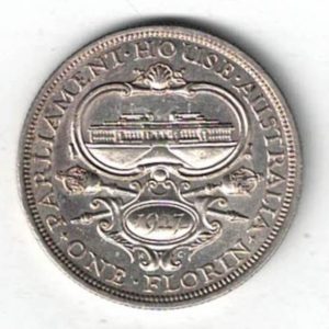 1927 Australia Silver One Florin Coin. The obverse features the bust of George V facing left. the reverse features the Australia coat of arms.